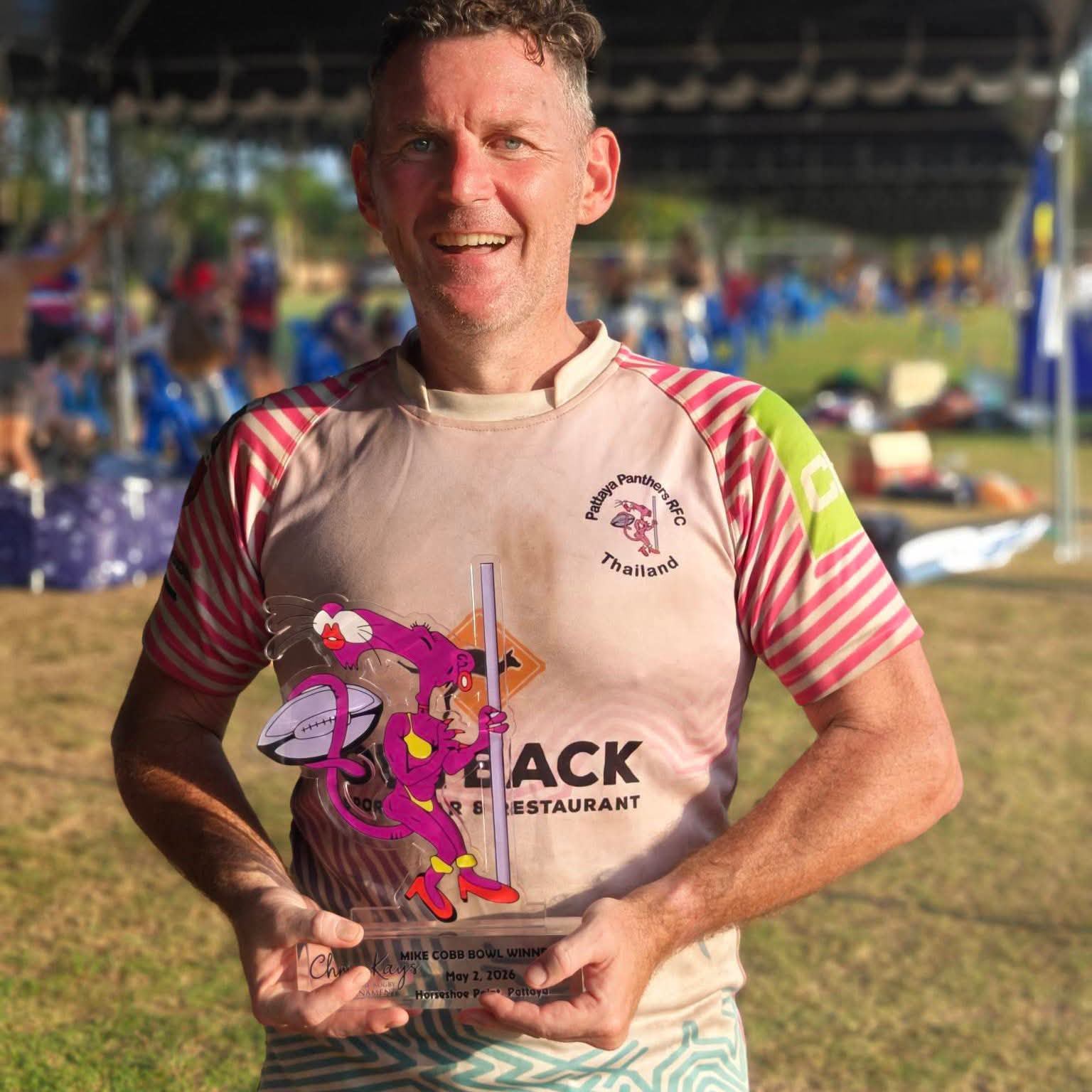 Tournament Director Paddy McKenna holding a trophy